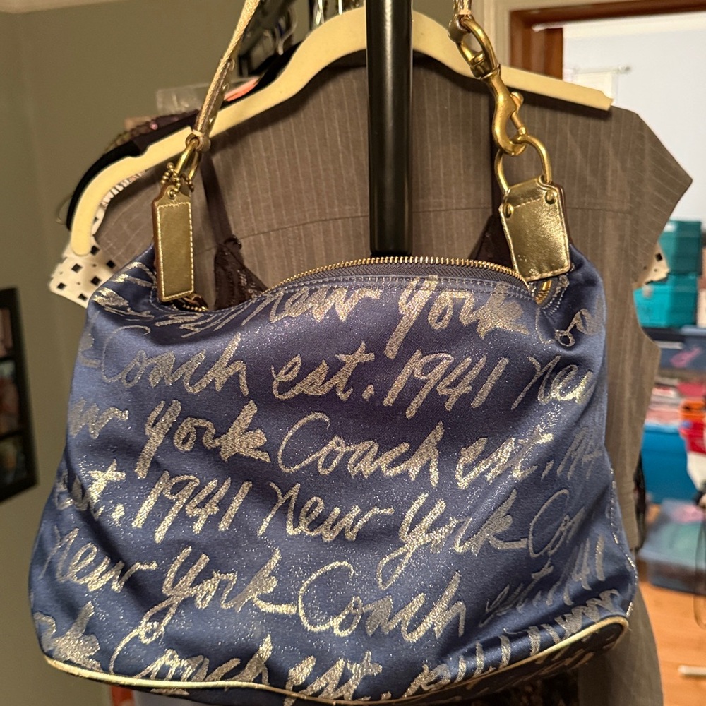 Coach Blue Handbag with Silver Script and Gold Accents